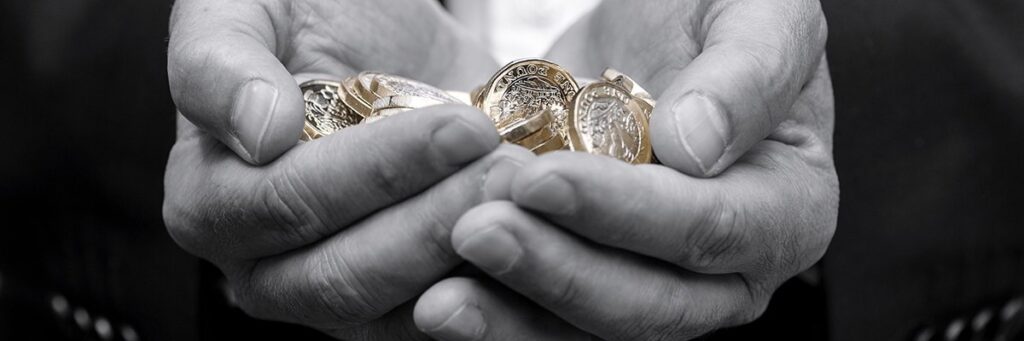 Money Sterling Hands Coins Getty